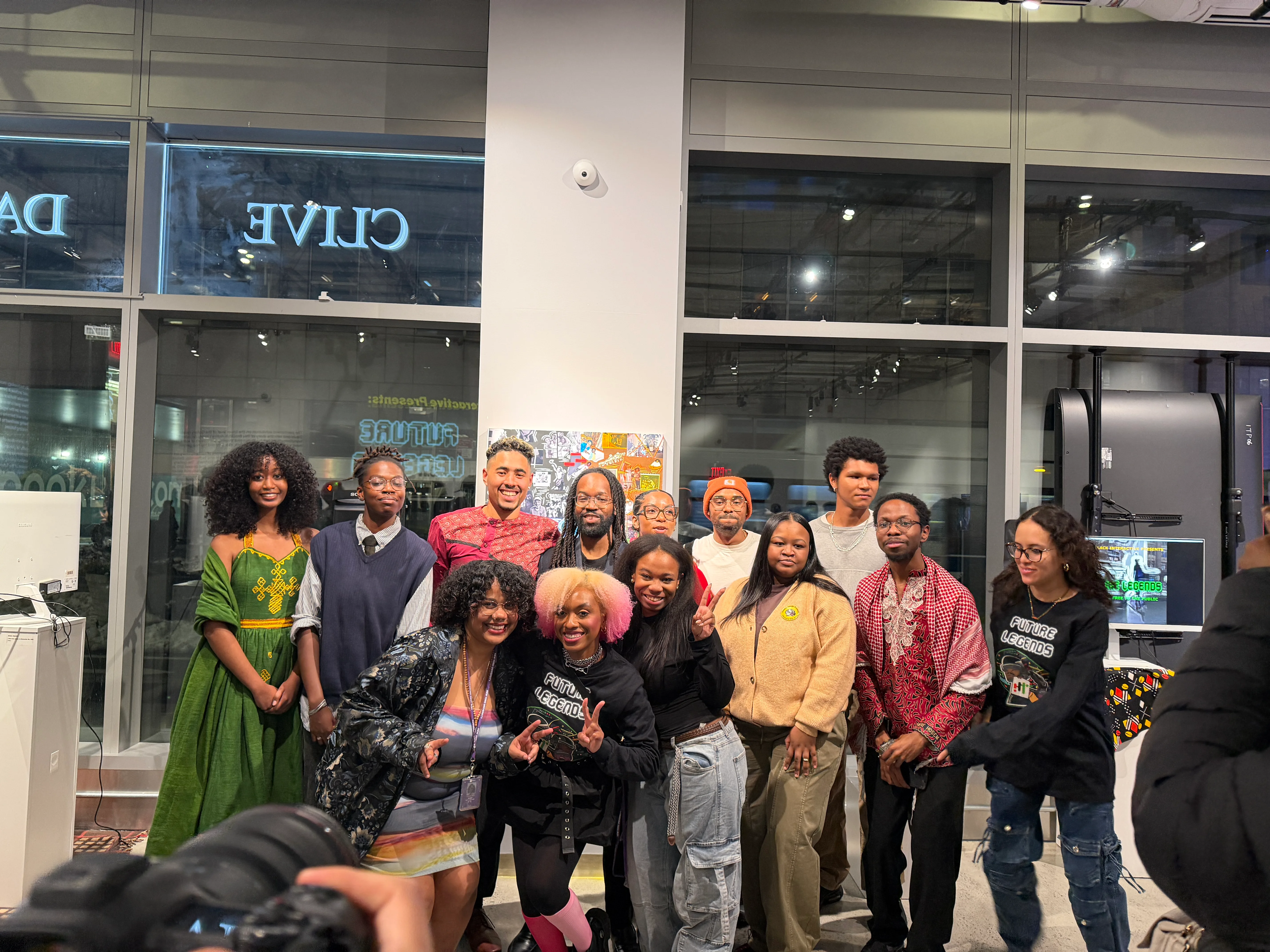 Group photo of Future Legends artists and organizers posing together at the Clive Davis Gallery